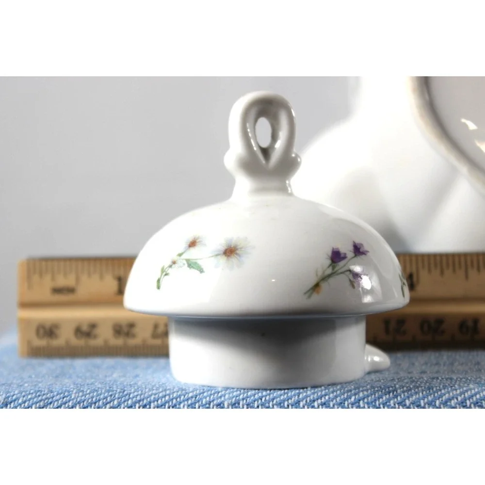 Tea/Coffee pot Elegance rabbit/flower design white bkgrd colored characters VTG